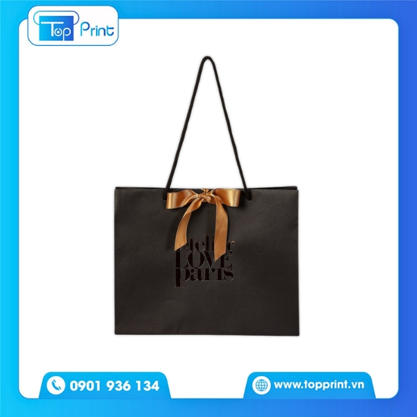 Túi Giấy Đen Sang Trọng Với Nơ Vàng Ánh Kim